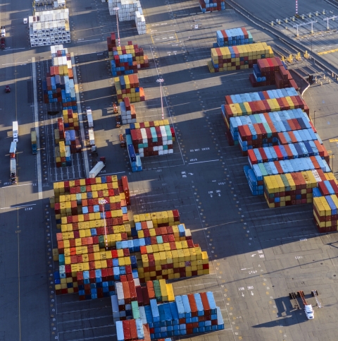 Aerial view of containers in shipping yard